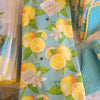 Kitchen Towel Bee Zesty Toss Lemons on Lt Blue Overall Print